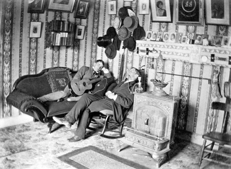 In this photo, circa 1875, Joseph Buffington, Trinity Class of 1875 and later creator of the College’s Bantam mascot, lounges on a sofa, while William G. Mather, Class of 1877, relaxes in a rocking chair in suite 28 of Brownell Hall on Trinity’s original campus. Photo courtesy of the Trinity College Archive